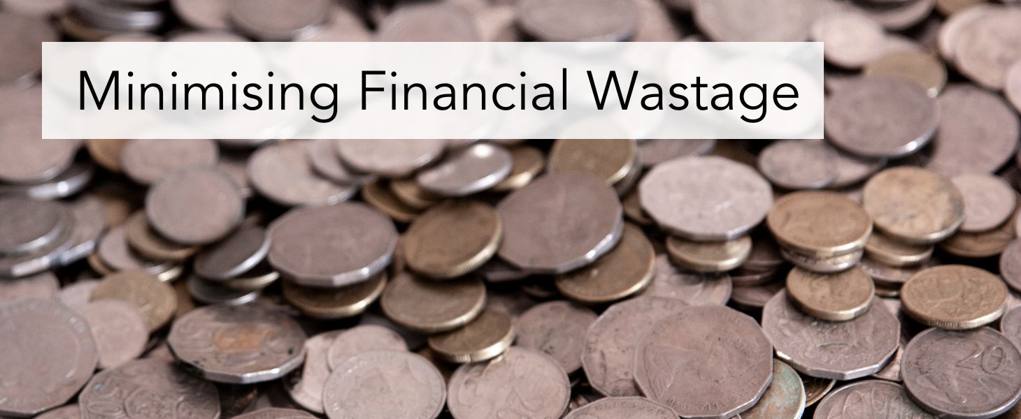Minimising Financial Waste - written atop coins